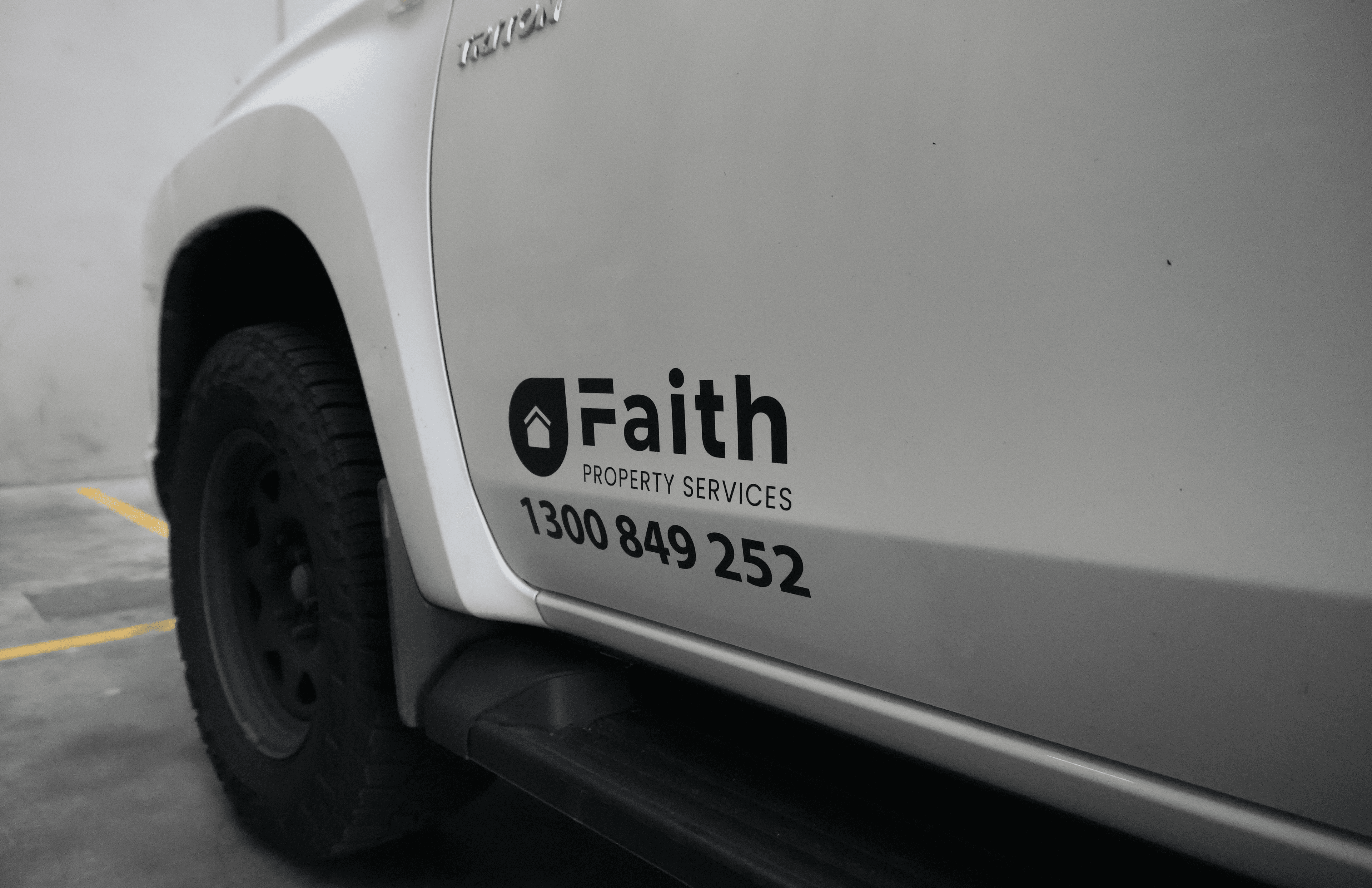 A Faith Property Services branded fleet vehicle